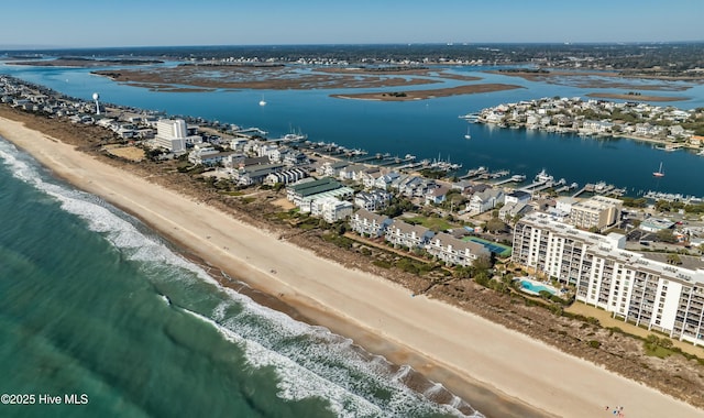 aerial view featuring a water view and a beach view