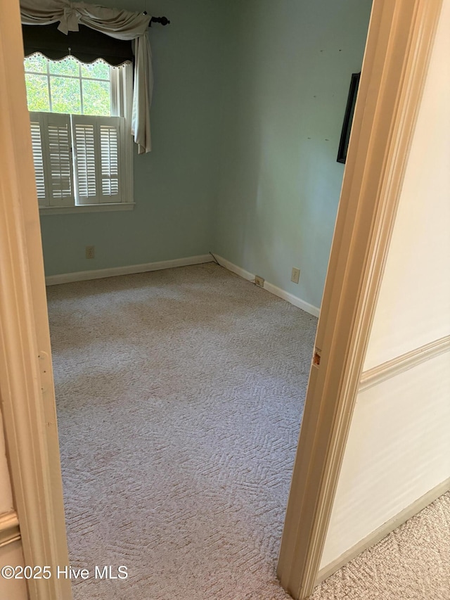 16 Bayberry Cir, Calabash, NC 28467 - empty room with carpet flooring, baseboards, and ceiling fan
