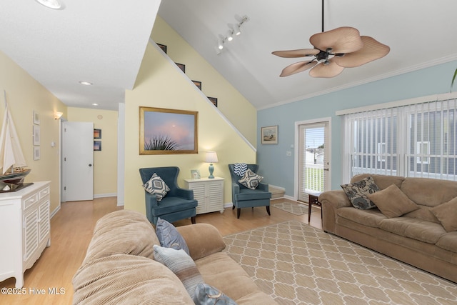 104 Island Quay Ct, Atlantic Beach, NC 28512 - living room with light wood-type flooring, lofted ceiling, a ceiling fan, ornamental molding, and baseboards