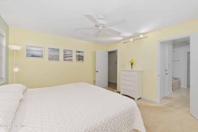 104 Island Quay Ct, Atlantic Beach, NC 28512 - bedroom with light colored carpet, ceiling fan, and baseboards
