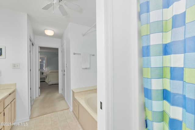 104 Island Quay Ct, Atlantic Beach, NC 28512 - full bath featuring vanity, a bath, a ceiling fan, and curtained shower