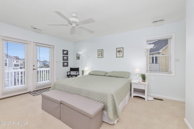 104 Island Quay Ct, Atlantic Beach, NC 28512 - bedroom with access to outside, light carpet, baseboards, and ceiling fan