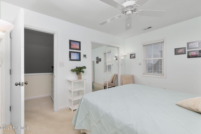 104 Island Quay Ct, Atlantic Beach, NC 28512 - bedroom with light colored carpet, a closet, baseboards, and ceiling fan