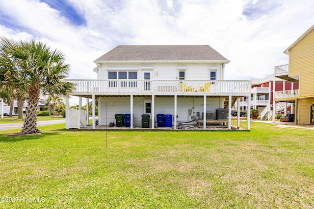 104 Island Quay Ct, Atlantic Beach, NC 28512 - rear view of property with a yard, a deck, central AC unit, and roof with shingles
