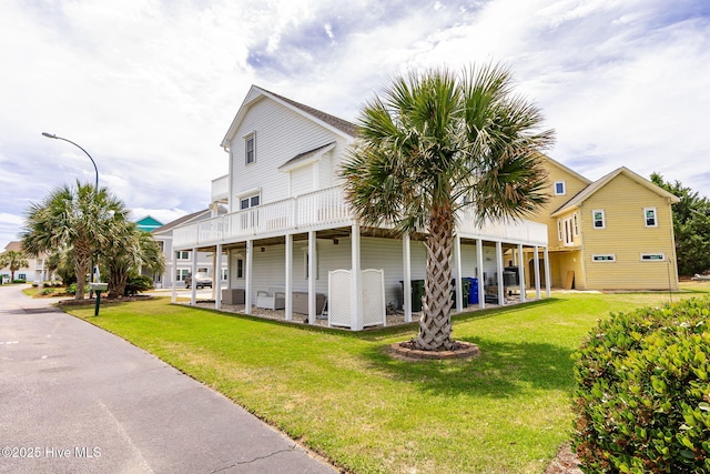 104 Island Quay Ct, Atlantic Beach, NC 28512 - back of house with a lawn