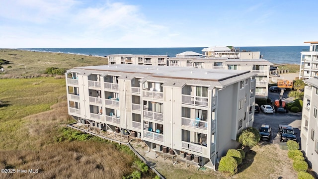 exterior space with a water view