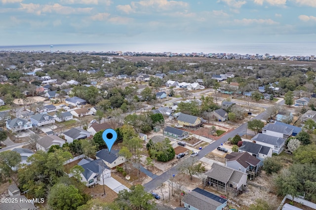 bird's eye view with a residential view and a water view