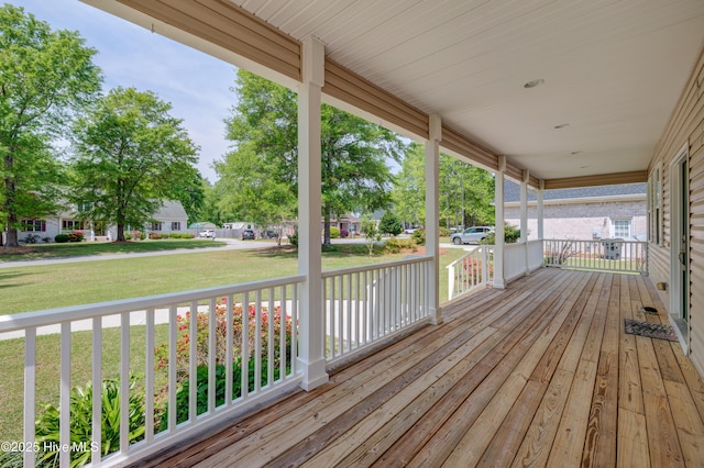 1708 N County Dr, Castle Hayne, NC 28429 - wooden porch with a lawn