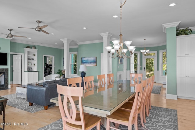 449 Maritime Pl, Pine Knoll Shores, NC 28512 - dining area featuring plenty of natural light, light wood-type flooring, recessed lighting, ornamental molding, and ceiling fan