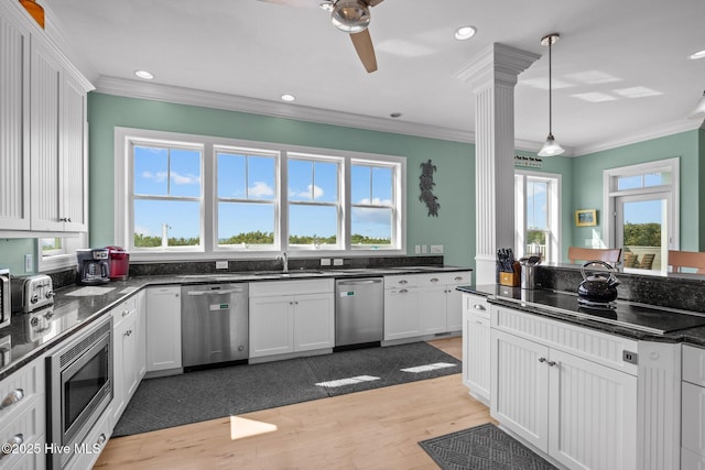 449 Maritime Pl, Pine Knoll Shores, NC 28512 - kitchen with appliances with stainless steel finishes, a sink, light wood-style flooring, crown molding, and ceiling fan