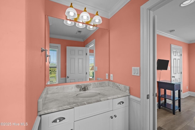 449 Maritime Pl, Pine Knoll Shores, NC 28512 - bathroom featuring wood finished floors, crown molding, and vanity