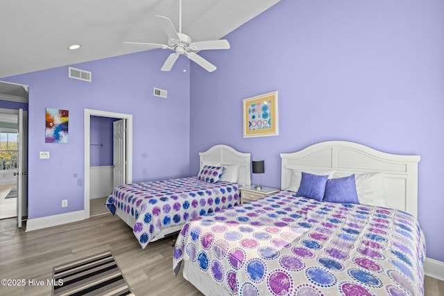 449 Maritime Pl, Pine Knoll Shores, NC 28512 - bedroom featuring wood finished floors, baseboards, a ceiling fan, and high vaulted ceiling