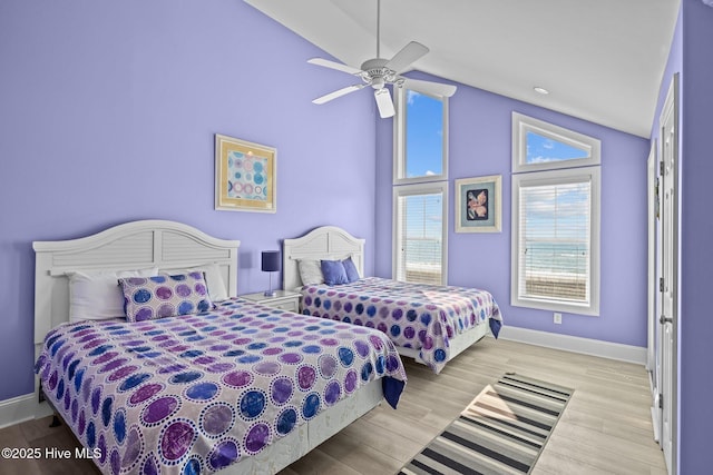 449 Maritime Pl, Pine Knoll Shores, NC 28512 - bedroom with baseboards, wood finished floors, high vaulted ceiling, and ceiling fan
