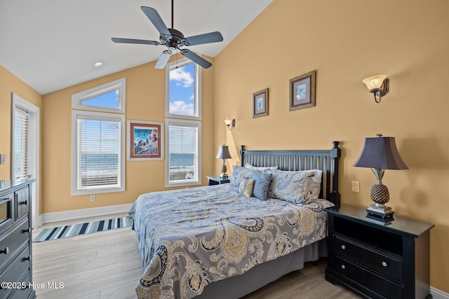 449 Maritime Pl, Pine Knoll Shores, NC 28512 - bedroom featuring vaulted ceiling, wood finished floors, baseboards, and ceiling fan
