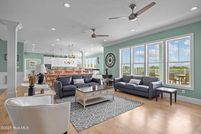 449 Maritime Pl, Pine Knoll Shores, NC 28512 - living area featuring decorative columns, ceiling fan, ornamental molding, recessed lighting, and light wood-style floors