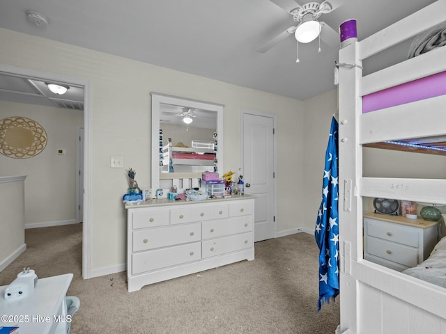 carpeted bedroom with baseboards and ceiling fan