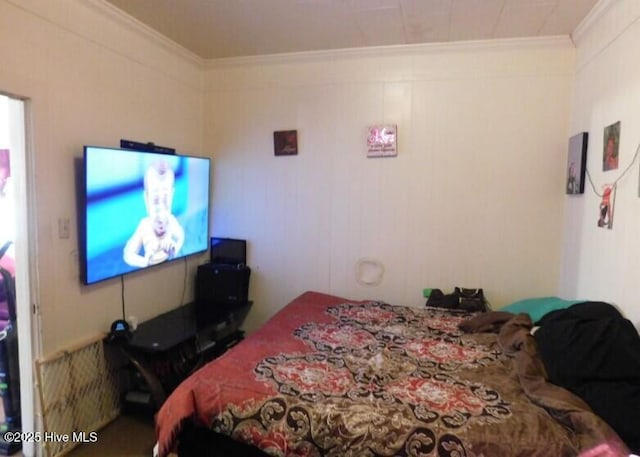 bedroom with ornamental molding