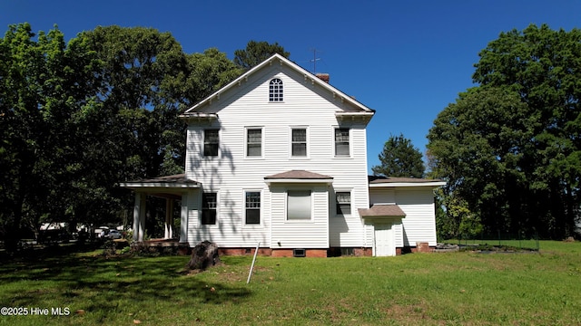 118 N 7th St, Smithfield, NC 27577 - greek revival house featuring a front lawn and a chimney