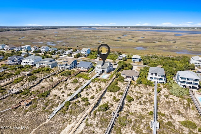 601 Caswell Beach Rd, Caswell Beach, NC 28465 - bird's eye view featuring a residential view and a water view