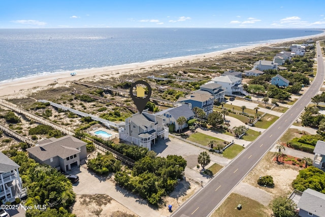 601 Caswell Beach Rd, Caswell Beach, NC 28465 - drone / aerial view with a beach view and a water view