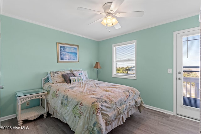 601 Caswell Beach Rd, Caswell Beach, NC 28465 - bedroom with wood finished floors and multiple windows