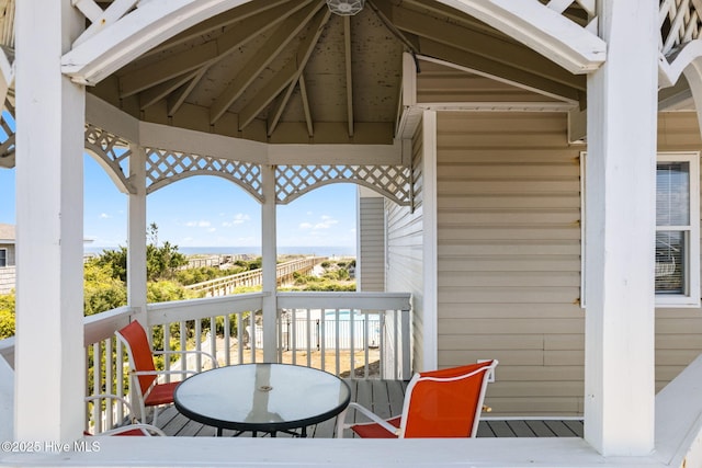 601 Caswell Beach Rd, Caswell Beach, NC 28465 - deck featuring a gazebo