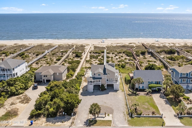 601 Caswell Beach Rd, Caswell Beach, NC 28465 - bird's eye view with a beach view, a water view, and a residential view