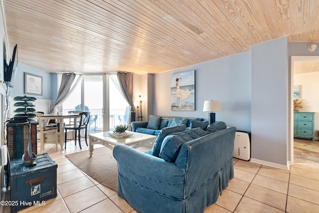 living room featuring light tile patterned floors and wooden ceiling