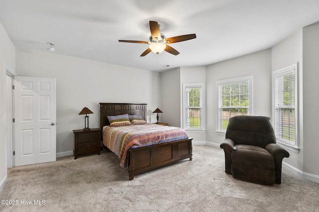 705 Shearwater Ln, Swansboro, NC 28584 - carpeted bedroom with baseboards and a ceiling fan