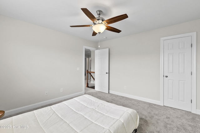 705 Shearwater Ln, Swansboro, NC 28584 - carpeted bedroom with baseboards and a ceiling fan