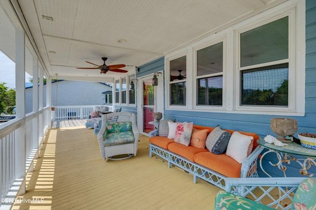deck featuring a ceiling fan