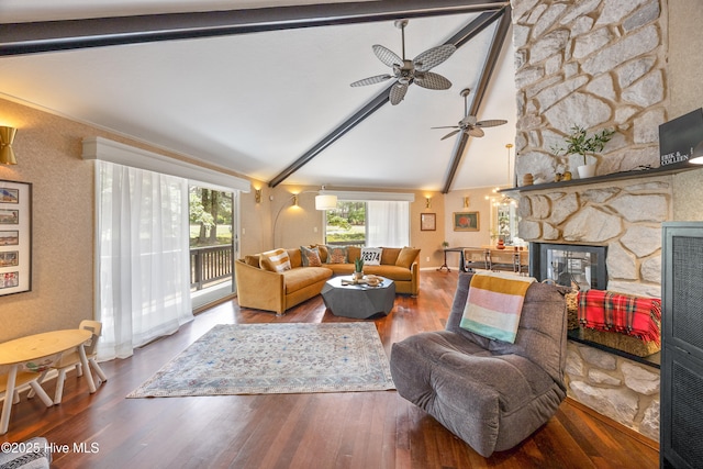 40 Inverness Rd, Pinehurst, NC 28374 - living room with beam ceiling, wood finished floors, ceiling fan, a fireplace, and high vaulted ceiling