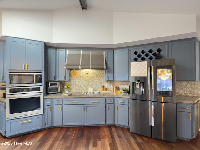 40 Inverness Rd, Pinehurst, NC 28374 - kitchen with stainless steel appliances, wall chimney range hood, tasteful backsplash, high vaulted ceiling, and beamed ceiling