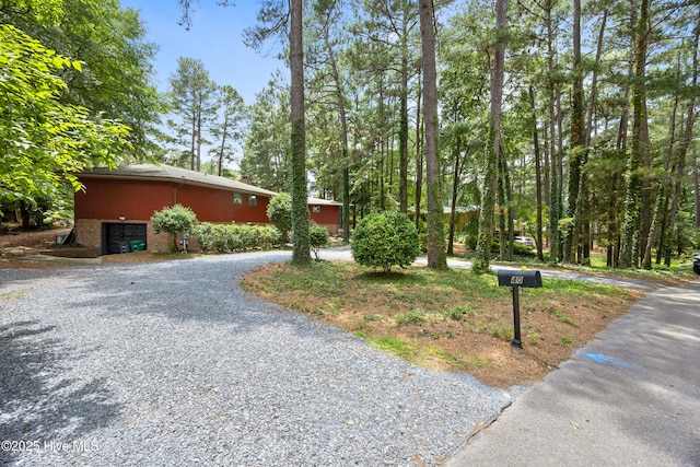 40 Inverness Rd, Pinehurst, NC 28374 - view of home's exterior with gravel driveway