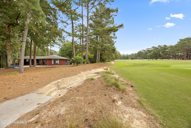 40 Inverness Rd, Pinehurst, NC 28374 - view of street featuring view of wooded area and golf course view