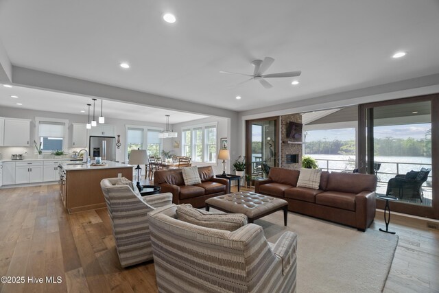 122 Back Creek Dr, Hertford, NC 27944 - living area with recessed lighting, ceiling fan, and light wood-style flooring