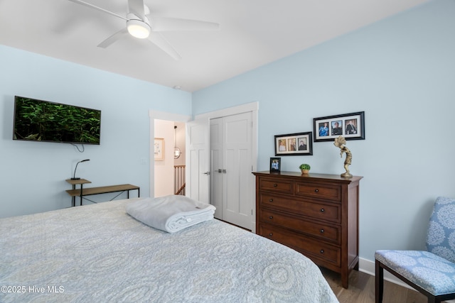122 Back Creek Dr, Hertford, NC 27944 - bedroom with a closet, baseboards, ceiling fan, and wood finished floors