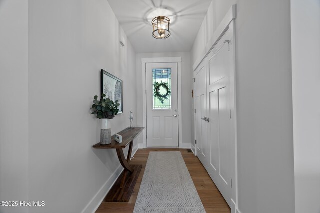 122 Back Creek Dr, Hertford, NC 27944 - doorway to outside featuring baseboards and dark wood finished floors