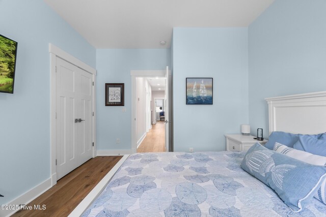 122 Back Creek Dr, Hertford, NC 27944 - bedroom featuring baseboards and wood finished floors