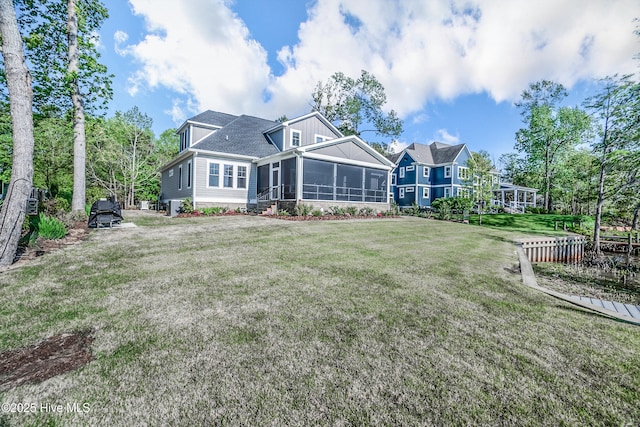 122 Back Creek Dr, Hertford, NC 27944 - back of house with a yard and a sunroom
