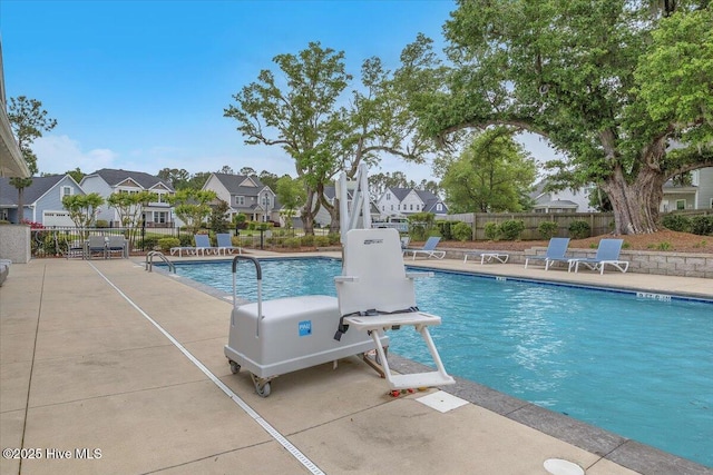144 Violetear Rdg, Hampstead, NC 28443 - community pool featuring a residential view and a patio area