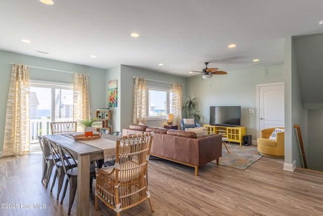 dining area with recessed lighting, a ceiling fan, and wood finished floors