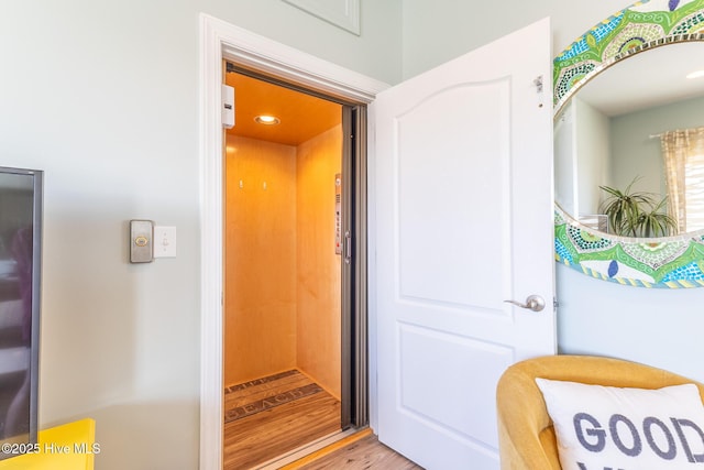 property entrance featuring elevator