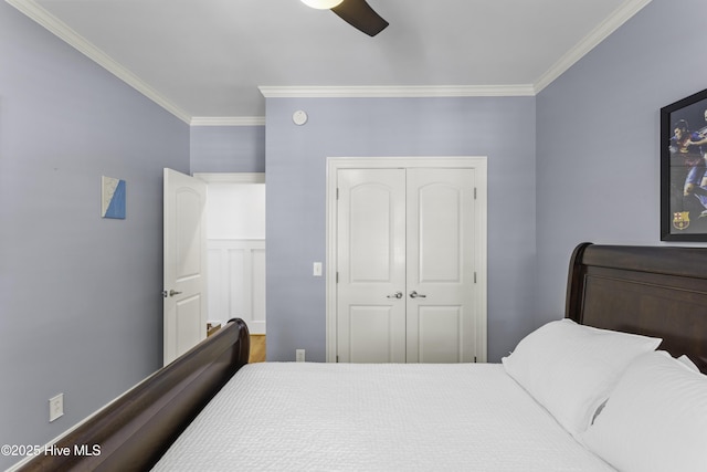 bedroom with a closet, crown molding, and ceiling fan