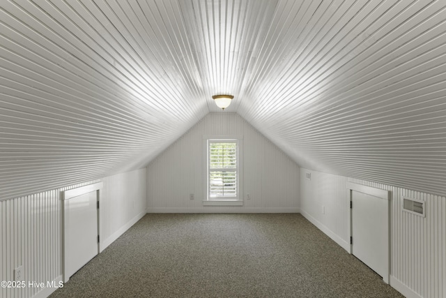 bonus room with wood ceiling, vaulted ceiling, carpet floors, and visible vents