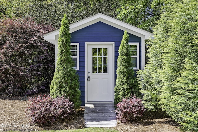view of outbuilding with an outdoor structure