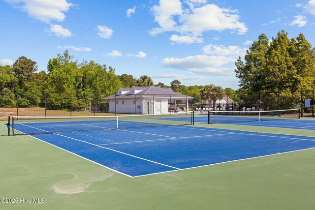 view of sport court with fence and community basketball court