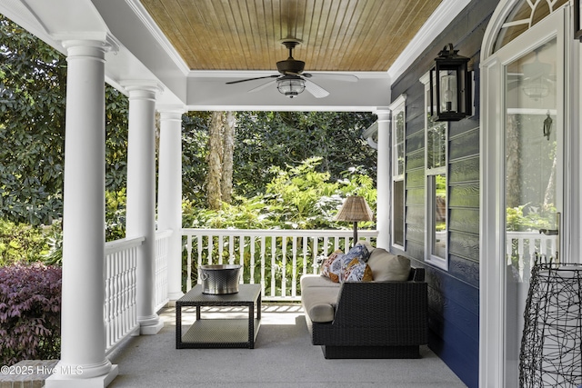 exterior space featuring a ceiling fan and a porch