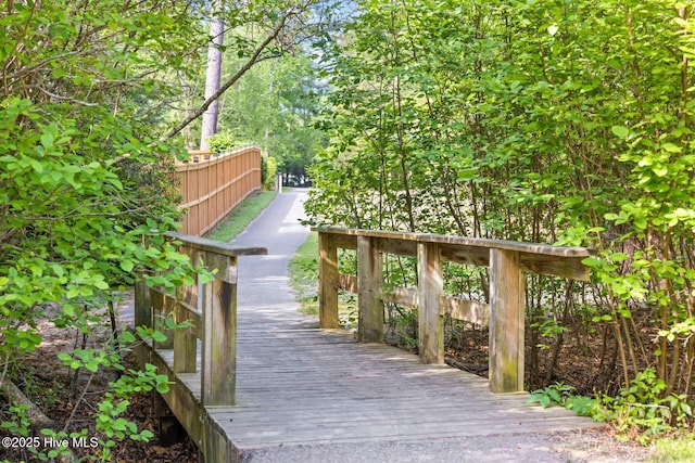 surrounding community featuring a deck