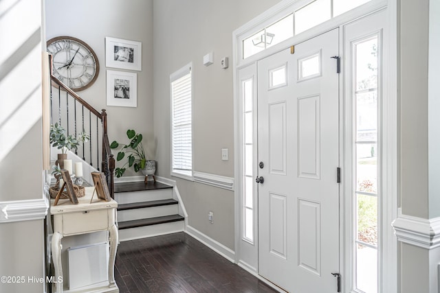 180 Cashew Loop, Cameron, NC 28326 - entrance foyer featuring stairs, baseboards, and dark wood-style floors